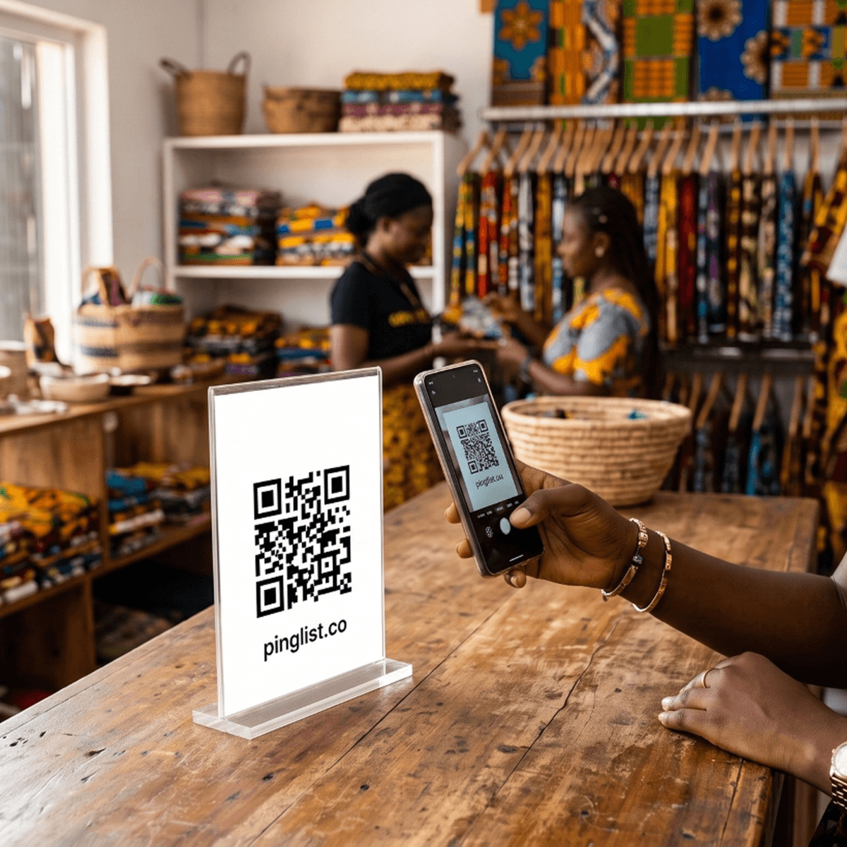 Customer scanning a Pinglist store QR code
