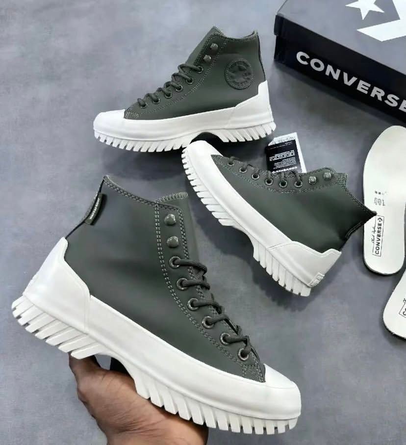 Olive green Converse Chuck Taylor All-Star Lugged Winter sneakers featuring a thick white platform sole