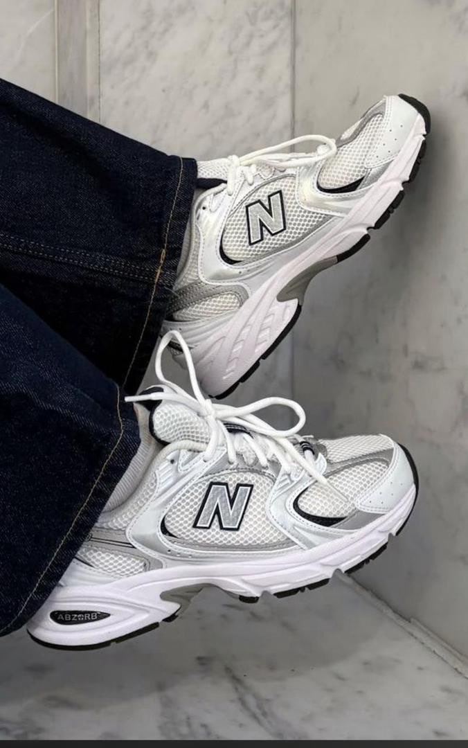 New Balance 530 sneakers in white with silver accents