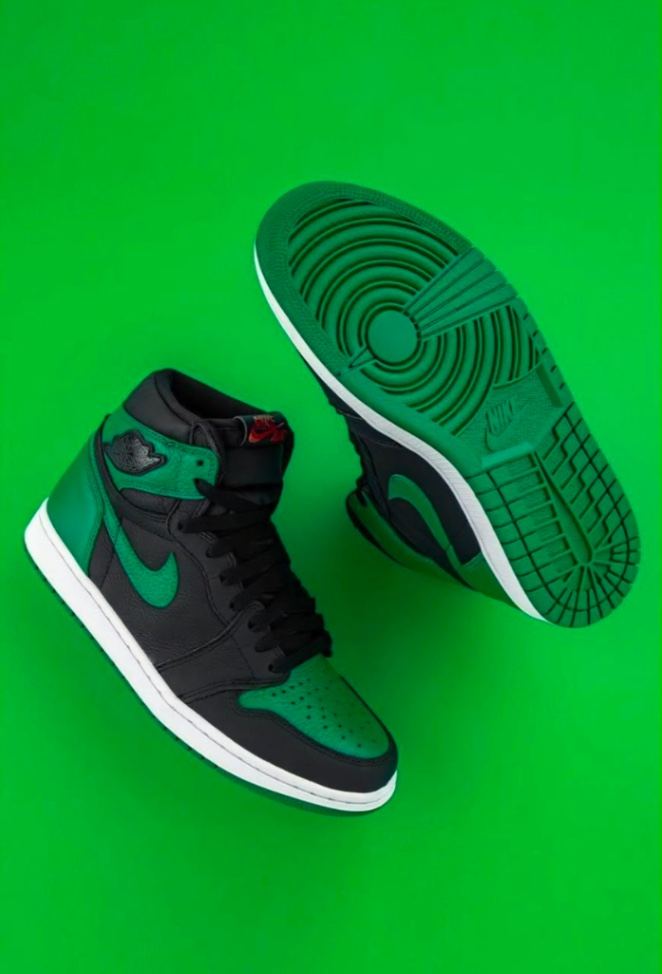 Nike Air Jordan 1 Retro High OG "Pine Green," featuring black and green leather with a red Nike Air tongue tag